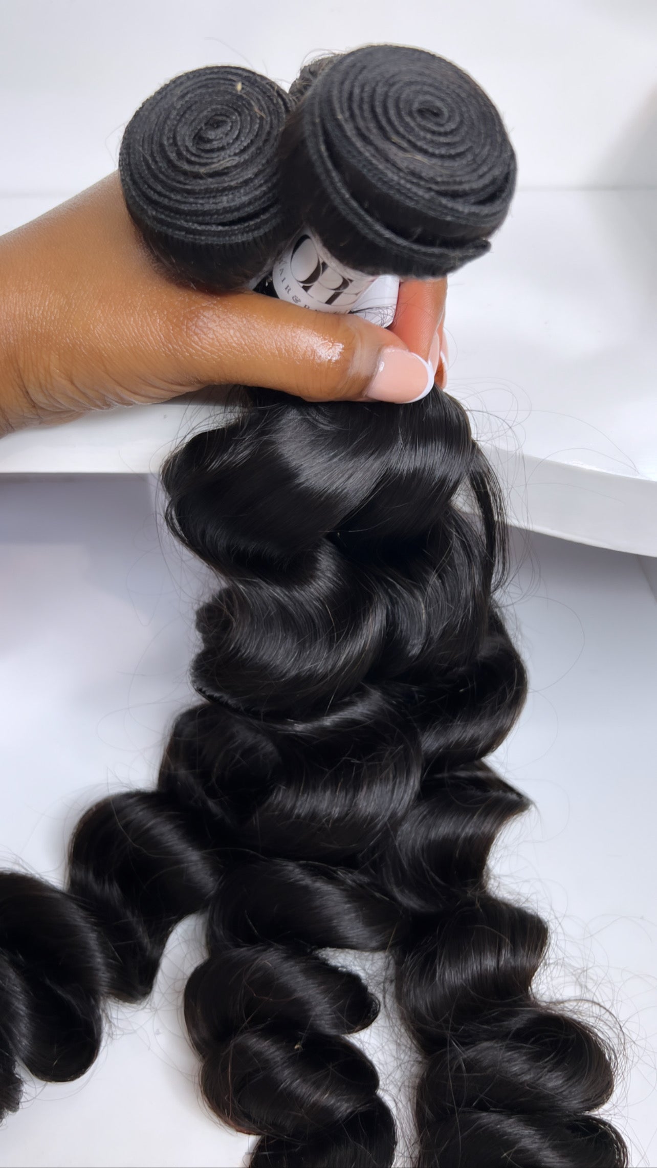 Virgin loose wave bundle